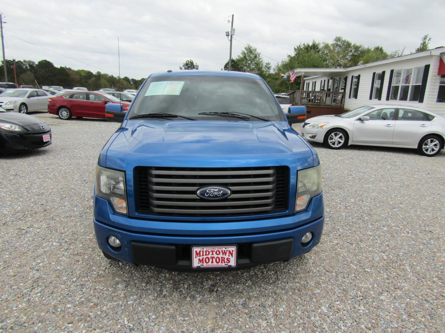 2011 Blue /Gray Ford F-150 FX2 SuperCrew 5.5-ft. Bed 2WD (1FTFW1CF1BK) with an 5.0L V8 engine, Automatic transmission, located at 15016 S Hwy 231, Midland City, AL, 36350, (334) 983-3001, 31.306210, -85.495277 - Photo#1